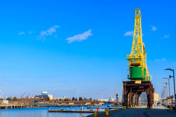 Old cranes on city boulevard in Szczecin, Poland