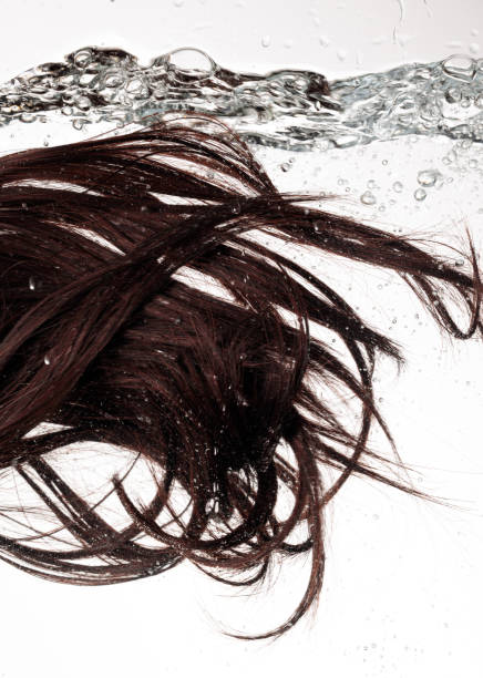istock hair underwater, hair washing 2167303513