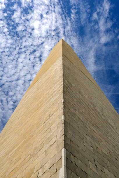Washington DC, District of Columbia, USA - 30 April 2024: Low angle view looking up the Washington Monument in Washington DC.