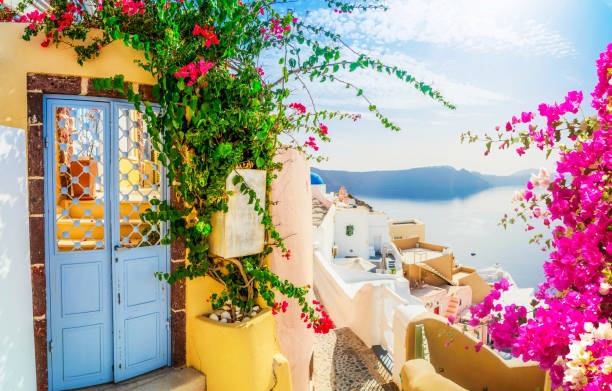traditional greek village Oia of Santorini, beautiful street against Aegan sea and caldera, Greece, web banner format