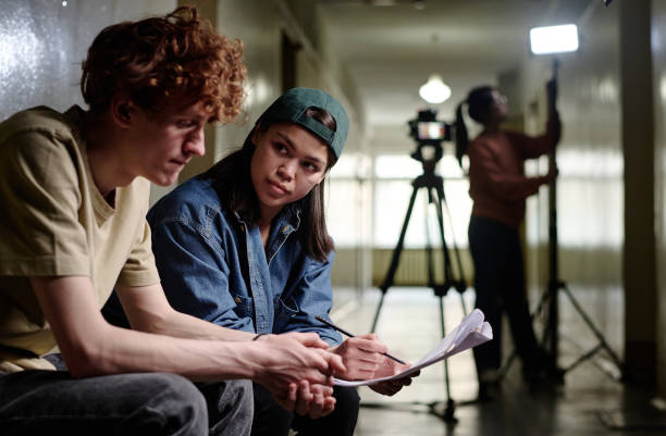 istock Discussing Scene Set-Up During Film Shooting Indoors 2167307303