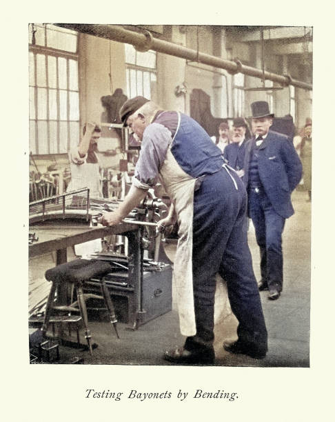 istock Bladesmith testing bayonets by bending, at the Royal Small Arms Factory in Sparkbrook, Birmingham, 1890s, Vintage photograph, 19th Century 2167307948