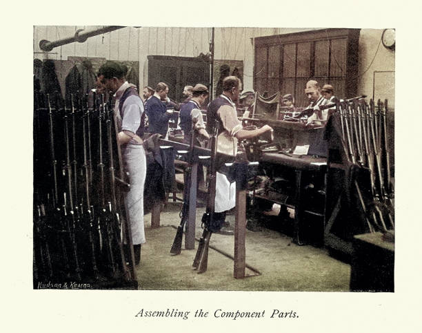 istock Gunsmiths, assembling parts, Workers manufacturing rifles at the Royal Small Arms Factory in Sparkbrook, Birmingham, 1890s, Vintage photograph, 19th Century 2167308721