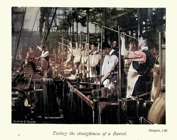 istock Gunsmiths, testing rifle barrels, Workers manufacturing rifles at the Royal Small Arms Factory in Sparkbrook, Birmingham, 1890s, Vintage photograph, 19th Century 2167308780