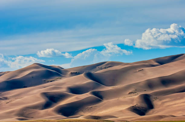 The dunes of Great Sand Dunes National Park, Colorado, USA - sand dunes in the setting sun
