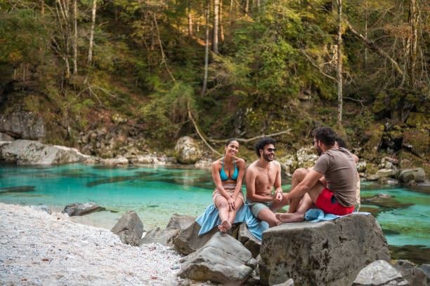 istock Mixed Race Friends Summer Weekend By The River 2167324705