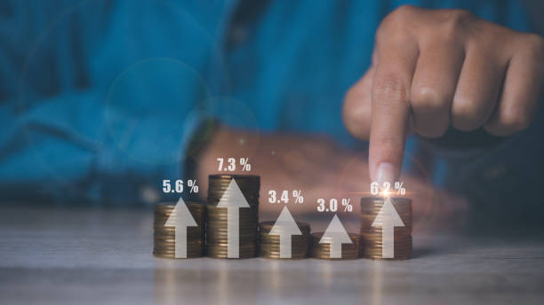 istock Businessman with stacking coins different height for interest rates from different investment, financial investment business stock growth. copy space. 2167331432