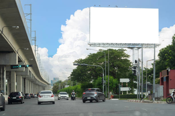 istock Blank billboard on one of Thailand's streets, a blank billboard with copy space for text or content 2167333806