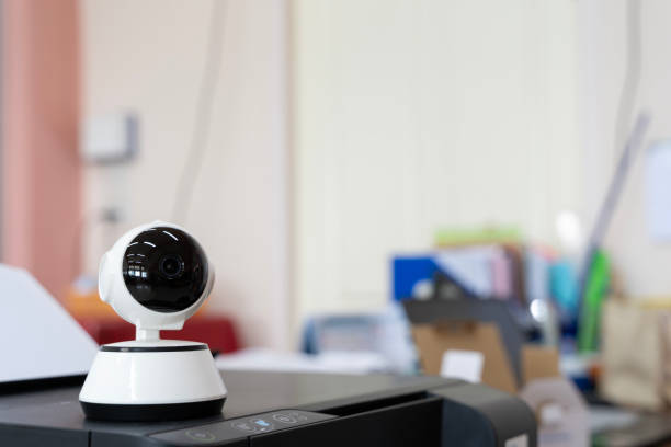 istock CCTV camera surveillance Safety system in the building. Security camera, white background 2167333811