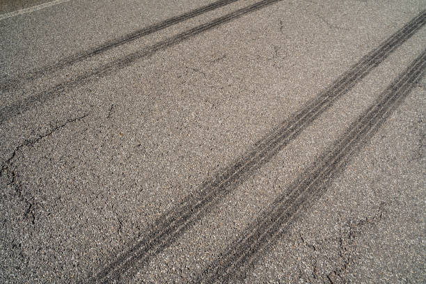 istock Street with drag marks from cars 2167334676