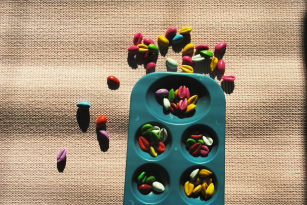 Congklak is a traditional Indonesian game played with a board with holes and seeds.