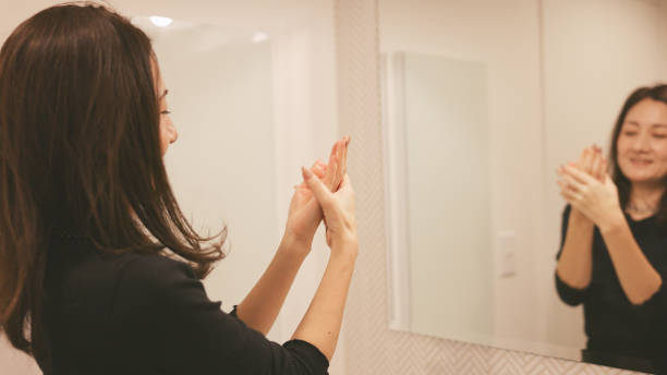 istock Woman apply hand cream on her hands at Bathroom 2167337544