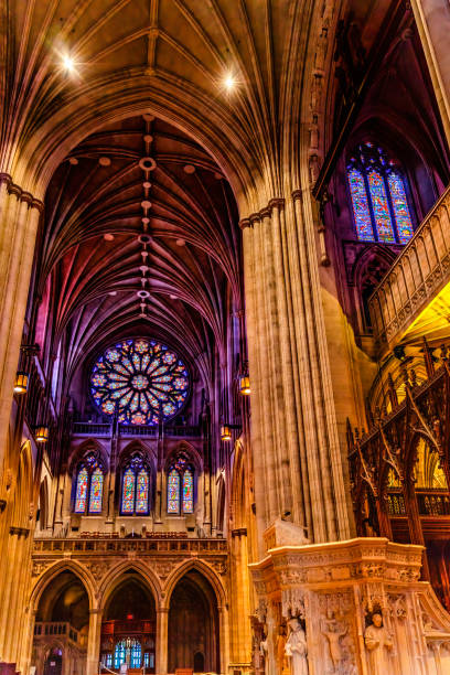 Pulpit Rose Stained Glass Basilica National Cathedral of St Peter and St Paul Episcopal Church Washington DC. Construction started 1907 based 1893 Congress charter.  Martin Luther King Gave Last Church Sermon here.