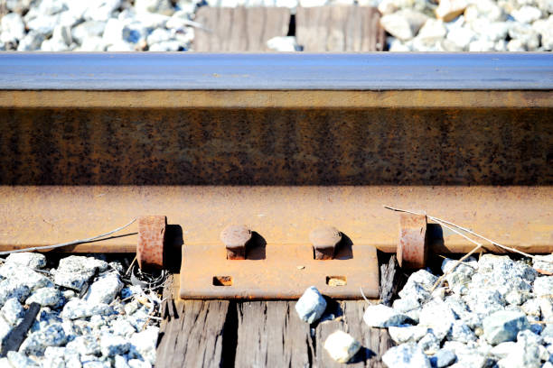 Railroad spike is a large nail with an offset head used to secure the rails and base plates on the railroad sleeper.
