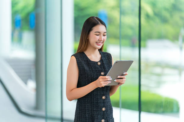 istock Young Businesswoman Using A Tablet 2167343068