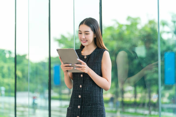 istock Young Businesswoman Using A Tablet 2167343096