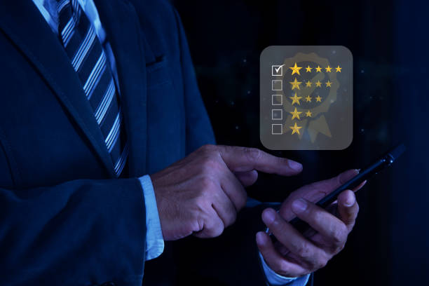 istock Businessman touch on five-star icon for feedback review satisfaction service, Customer service experience and business satisfaction survey 2167344155