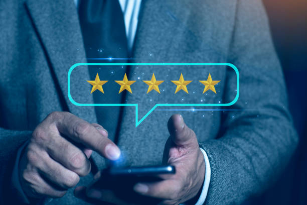 istock Businessman touch on five-star icon for feedback review satisfaction service, Customer service experience and business satisfaction survey. 2167344165