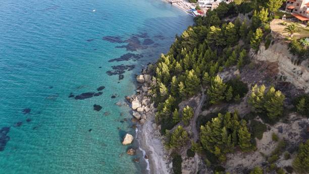 istock Pristine Coastal Beach with Pebble Shoreline and Azure Water 2167344400