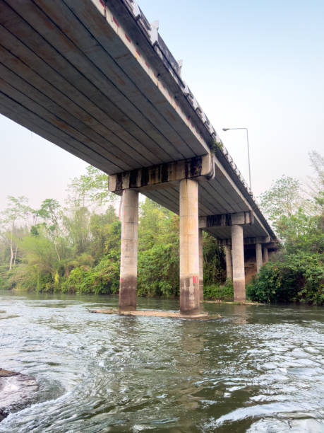 istock Large concrete bridge over the river. View from below 2167344839