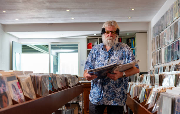 istock Record store owner in  his shop. 2167345098