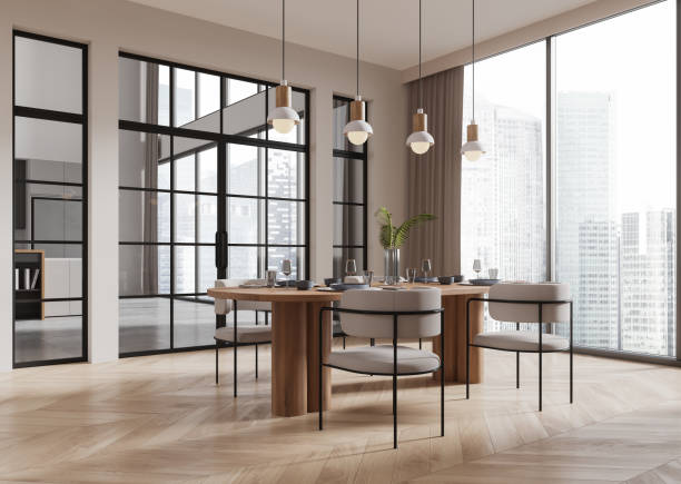 istock Beige home kitchen interior with dining and cooking space, panoramic window 2167346955