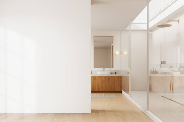 istock Modern home bathroom interior with sink and glass shower. Mockup wall 2167346965