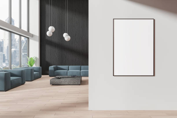 istock Blank poster mockup in modern living room with blue sofas and large windows. 3D Rendering 2167348304