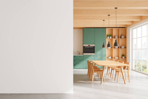 istock Home kitchen interior with dining table, cabinet and window. Mock up wall 2167348341