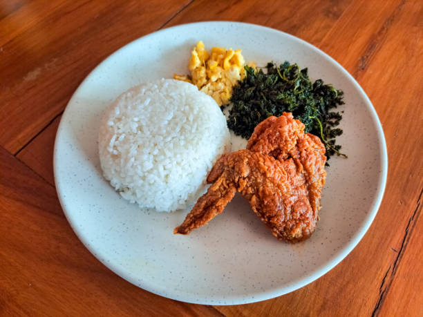 Delicious Hot Spicy Fried Chicken Rice With Scrambled Egg And Crispy Spinach. Food Menu.