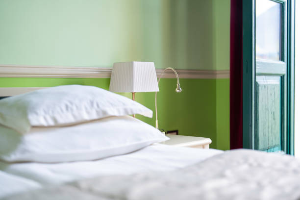 istock Vintage Hotel Charm with Classic Bedside Lamp 2167348700