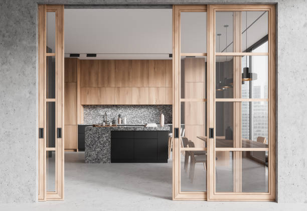 istock Stone kitchen interior with cooking and dining area, bar island and window 2167348928