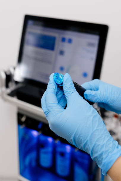 istock A cosmetologist sets up a Hydradermabrasian device in a modern spa clinic, getting ready for an advanced facial treatment. Ideal for promoting cutting-edge skincare solutions, anti-aging, and acne-fighting 2167350126
