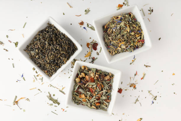 istock Concept of cooking tea with different types of tea on white background 2167350530