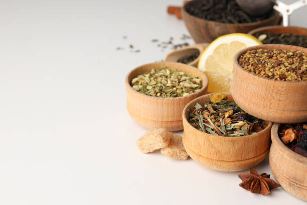 istock Concept of cooking tea with different types of tea on white background 2167351443