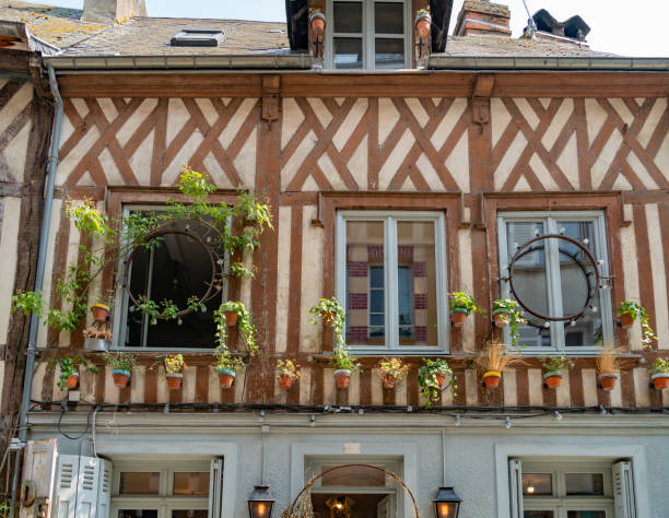 Beautiful facades of the old buildings at the harbour of Honfleur, famous french town in Normandy