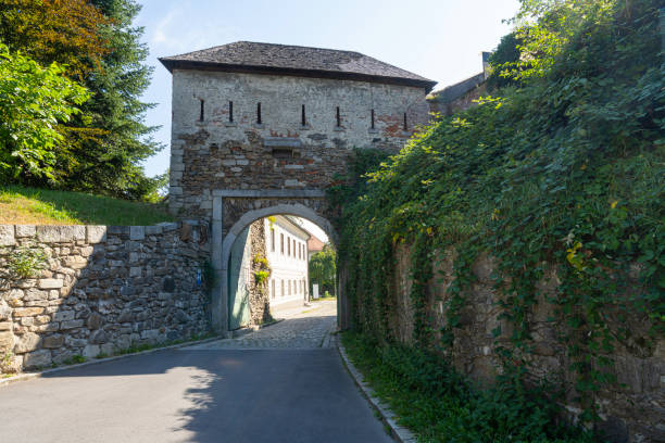 Linz, Austria. August 12, 2024.  the ancient entrance gate to the castle on the hill in the city centre