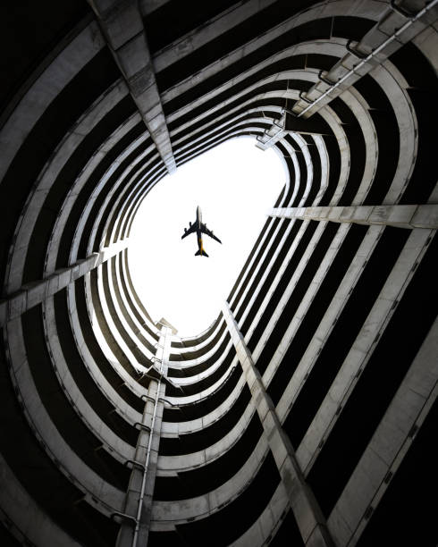 istock Aircraft Flying Over Carpark 2167357886