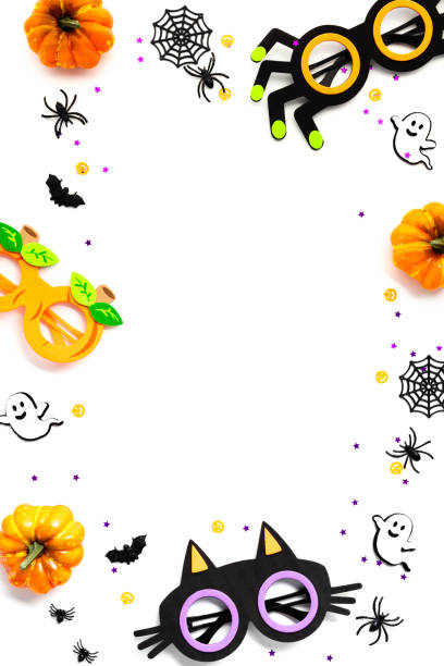 istock Halloween flat lay composition with pumpkins, party sunglasses, spiders, bats, ghosts on white background. Happy Halloween banner mockup. 2167358277