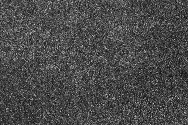 black asphalt road closeup tarmac view scenery with blurred background. Selective focus\