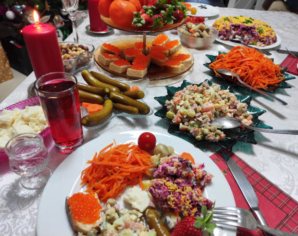 istock Festive New Year's table with salads, snacks, red caviar and a drinks 2167362115