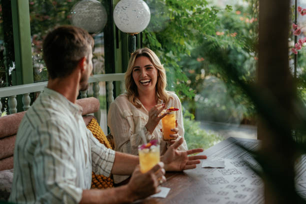 istock Couple enjoying drinks in a cafe 2167363277