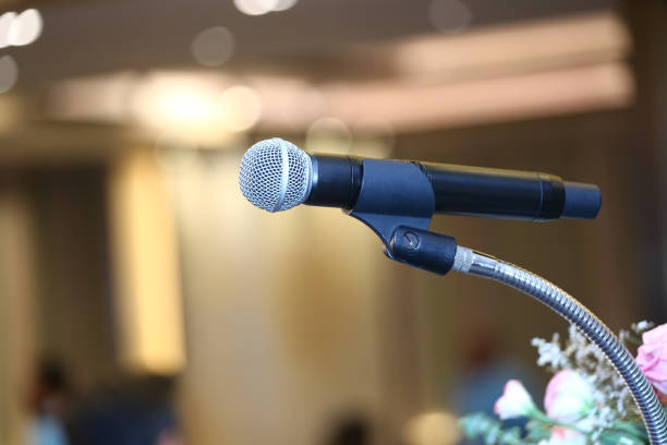 istock Microphone on the podium at a seminar. 2167364243