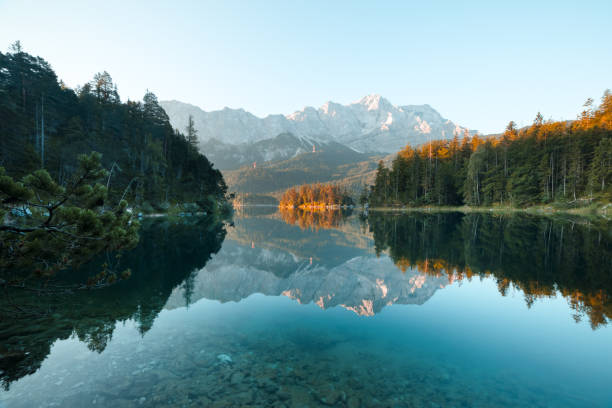 istock Fantastic morning on mountain lake Eibsee 2167365251