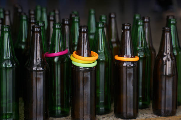 Beer bottle against a color background