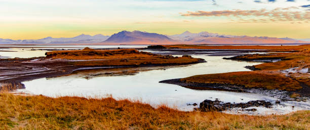 A beautiful landscape with a river running through it