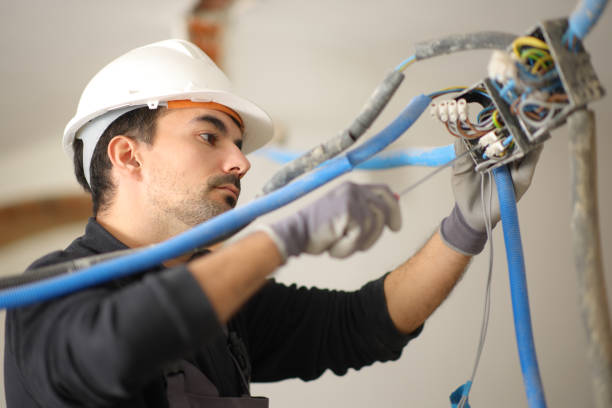 istock Electrician installing electrical system in a house under reform 2167366764