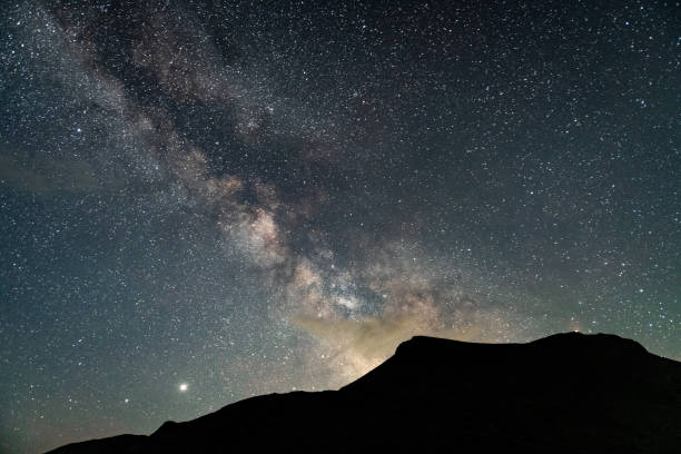 istock Mountains range against the backdrop of an incredible starry sky 2167371798