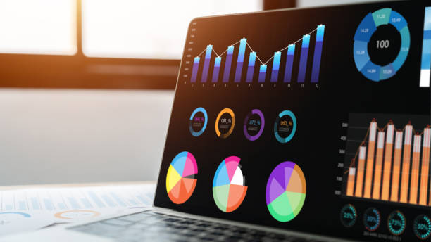 istock A laptop screen displays a colorful graph with various colored pie charts. The graph appears to be a visual representation of data, possibly related to sales or market trends 2167372132