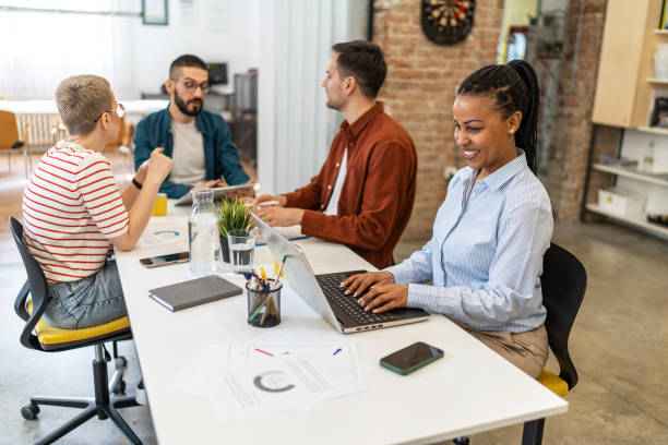 istock Business people collaborating in a modern office. 2167373386